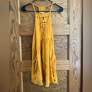 Honey Punch mustard cutout swing dress